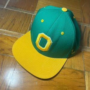 Zephyr University of Oregon green and yellow snap back.